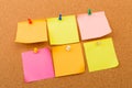 Cork board with pinned colored blank notes - Image Royalty Free Stock Photo