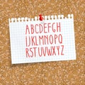 Cork board with a pinned sheet of paper in a cage. alphabet for writing text. seamless background cork board Royalty Free Stock Photo