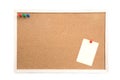 Cork board with post it and push pins and wooden frame on white Royalty Free Stock Photo