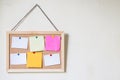 Cork board with several colorful blank notes with pins Royalty Free Stock Photo