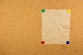 Cork board with sticky note pinned Royalty Free Stock Photo