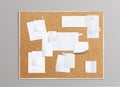 Cork board with white note papers Royalty Free Stock Photo