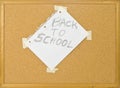 Cork bulletin board with back to school note. Royalty Free Stock Photo