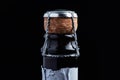 A cork champagne with bottle on a black background Royalty Free Stock Photo