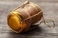 Cork from champagne or wine on the old wooden table. Royalty Free Stock Photo