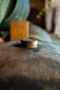 Cork close up, old porto lodge with rows of oak wooden casks for slow aging of fortified ruby or tawny porto wine in Vila Nova de Royalty Free Stock Photo