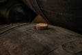 Cork close up, old porto lodge with rows of oak wooden casks for slow aging of fortified ruby or tawny porto wine in Vila Nova de Royalty Free Stock Photo