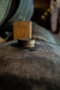 Cork close up, old porto lodge with rows of oak wooden casks for slow aging of fortified ruby or tawny porto wine in Vila Nova de Royalty Free Stock Photo