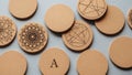 Cork texture. Some coasters display intricate patterns while one Royalty Free Stock Photo