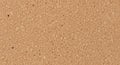 Cork texture, consisting of small, irregularly shaped tan-colored granules. The surface i Royalty Free Stock Photo
