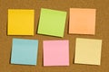 Colorful notes on cork board Royalty Free Stock Photo