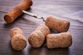 Corks of chmapagne and corkscrew on vintage wooden Royalty Free Stock Photo