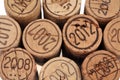 Corks from French wine bottles of different years seen from above