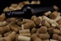 Corks from wine bottles empty wine bottle on black back Royalty Free Stock Photo