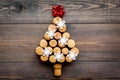 Corks of wine bottles in shape of new year spruce on dark wooden background top view copyspace Royalty Free Stock Photo