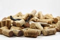 Corkscrew on heap of wine corks