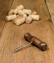 corkscrew for open wine bottle on wooden background Royalty Free Stock Photo