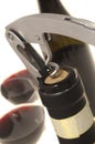 Corkscrew opening wine bottle