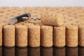 Corkscrew and wine cork as background. Limited depth of field Royalty Free Stock Photo