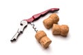 Corkscrew and wine corks isolated on white background Royalty Free Stock Photo