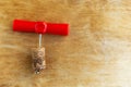 Corkscrew with wine stopper on wooden background