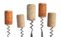 Corkscrews with wine corks on white background