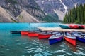 Corlorful canoes on Moraine lake near Lake Louise village in Banff National Park, Alberta, Rocky Mountains Canada