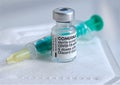 Macro of Comirnaty vaccination ampoule with a syringe against Covid-19 or Corona virus Royalty Free Stock Photo