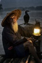 Cormorant fisherman with his bird