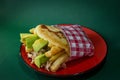 Corn arepas stuffed with beef, chicken breast, pork ham, mozzarella cheese and avocado Royalty Free Stock Photo