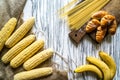 Corn, bananas, spaghetti and pies on a white background Royalty Free Stock Photo