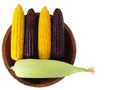 Corn, Boiled yellow and purple corn on wooden tray with fresh corn on the cob Royalty Free Stock Photo