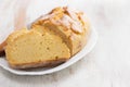 Corn bread with knife on white dish Royalty Free Stock Photo