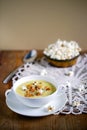 Corn chowder soup with wild mushrooms, chanterelles