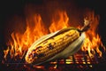 Corn on the cob cooking on a fiery BBQ grill
