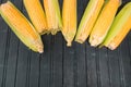 Corn cobs on a black background Royalty Free Stock Photo