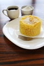 Corn couscous with coconut and cup of coffee. Traditional Brazilian breakfast, especially in northeastern Brazil