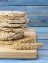 Corn crackers on a blue wooden table. Royalty Free Stock Photo