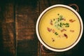 Corn cream soup with bacon chowder on wooden background. Royalty Free Stock Photo