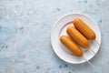 Corn dog traditional American corndog street junk food deep fried hotdog meat sausage snack Royalty Free Stock Photo