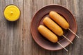 Corn dog traditional American corndog street junk food deep fried hotdog meat sausage treat Royalty Free Stock Photo