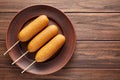 Corn dog traditional American street food deep fried hotdog meat sausage snack