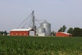Corn farm and corn grain processing in the American Midwest. Corn can be processed into feed, fuel or consumer food products Royalty Free Stock Photo