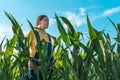 Corn farmer in field, portrait of agronomist woman