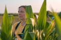 Corn farmer in field, portrait of agronomist woman