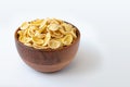 Corn flake in bowl on white background, healthy breakfast concept Royalty Free Stock Photo