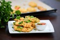 Corn flakes breaded deep fried chicken breast sticks on white plate Royalty Free Stock Photo