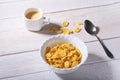 Corn Flakes cereal in a bowl and cap with espresso coffee. Morning breakfast. Royalty Free Stock Photo