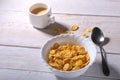 Corn Flakes cereal in a bowl and cap with espresso coffee. Morning breakfast. Royalty Free Stock Photo