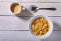 Corn Flakes cereal in a bowl and cap with espresso coffee. Morning breakfast. Royalty Free Stock Photo